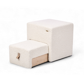 Two textured ottomans on a white background